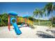 playground with swings and slides at 2746 Via Tivoli # 132B, Clearwater, FL 33764