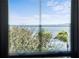 Bedroom window view of a bridge and water at 2746 Via Tivoli # 132B, Clearwater, FL 33764