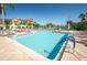 Inviting resort-style pool with plenty of lounge chairs at 2746 Via Tivoli # 132B, Clearwater, FL 33764