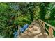 Private wooden dock offering serene views and direct water access at 1377 N Mcmullen Booth Rd # 1377, Clearwater, FL 33759