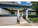 Well-maintained exterior with covered entryway and landscaping at 1377 N Mcmullen Booth Rd # 1377, Clearwater, FL 33759
