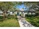 Community building with lush green landscaping at 1377 N Mcmullen Booth Rd # 1377, Clearwater, FL 33759