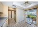 View of kitchen with breakfast bar and access to patio at 1377 N Mcmullen Booth Rd # 1377, Clearwater, FL 33759