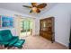 Cozy office space with a comfortable chair and built-in shelving at 1377 N Mcmullen Booth Rd # 1377, Clearwater, FL 33759