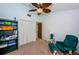 Bright office with a comfortable chair and built-in shelving at 1377 N Mcmullen Booth Rd # 1377, Clearwater, FL 33759