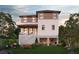 Two-story home with backyard, patio, and attached garage at 1735 Massachusetts Ne Ave, St Petersburg, FL 33703