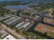 Aerial view of waterfront property with boat slips and canal access at 200 Meres Blvd # 11, Tarpon Springs, FL 34689