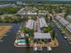 Aerial view showing community pool and waterfront access at 200 Meres Blvd # 11, Tarpon Springs, FL 34689