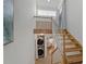 Staircase with washer and dryer, leading to upper level at 200 Meres Blvd # 11, Tarpon Springs, FL 34689