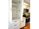 White kitchen cabinets with ample storage space at 7267 Teaberry St, Englewood, FL 34224