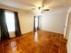 Well-lit bedroom featuring tile floors and plenty of natural light at 7267 Teaberry St, Englewood, FL 34224