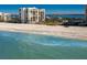 Aerial view of beachfront condo building with ocean access at 1460 Gulf Blvd # 1212, Clearwater Beach, FL 33767