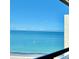 Stunning ocean view from balcony, featuring calm water and blue sky at 1460 Gulf Blvd # 1212, Clearwater Beach, FL 33767