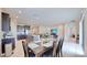 Open concept kitchen with island and stainless steel appliances at 30964 Penny Surf Loop, Wesley Chapel, FL 33545