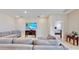 Relaxing living room featuring comfortable couches and a TV at 30964 Penny Surf Loop, Wesley Chapel, FL 33545