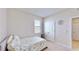 Charming bedroom with a double bed and closet at 30964 Penny Surf Loop, Wesley Chapel, FL 33545
