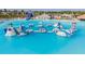 Large resort-style pool with water features at 30964 Penny Surf Loop, Wesley Chapel, FL 33545