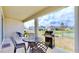 Enjoy this covered patio overlooking the lake at 30964 Penny Surf Loop, Wesley Chapel, FL 33545