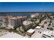 Aerial perspective of the condo building near the water at 17710 Gulf Blvd # 202, Redington Shores, FL 33708