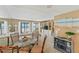 Bright dining area with glass table and ocean view at 17710 Gulf Blvd # 202, Redington Shores, FL 33708