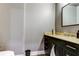 Bathroom with single sink vanity and toilet at 331 Cleveland St # 317, Clearwater, FL 33755