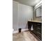 Bathroom with single sink vanity and toilet at 331 Cleveland St # 317, Clearwater, FL 33755