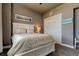 Comfortable bedroom with a queen-size bed and closet at 331 Cleveland St # 317, Clearwater, FL 33755