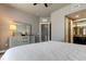 Spacious bedroom with dresser and ensuite bathroom access at 331 Cleveland St # 317, Clearwater, FL 33755