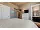 Bright bedroom with large bed and ensuite bathroom access at 331 Cleveland St # 317, Clearwater, FL 33755