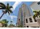 Modern high-rise building with palm trees and city views at 331 Cleveland St # 317, Clearwater, FL 33755