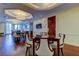 Bright common area with multiple tables and chairs, hardwood floors at 331 Cleveland St # 317, Clearwater, FL 33755