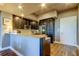 Modern kitchen with granite countertops and stainless steel appliances at 331 Cleveland St # 317, Clearwater, FL 33755