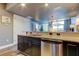 Modern kitchen with granite countertops and stainless steel appliances at 331 Cleveland St # 317, Clearwater, FL 33755