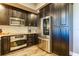 Updated kitchen featuring stainless steel appliances and ample cabinetry at 331 Cleveland St # 317, Clearwater, FL 33755