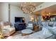 Spacious living room with comfortable seating and a large TV at 331 Cleveland St # 317, Clearwater, FL 33755