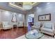 Bright lobby with hardwood floors and comfortable seating at 331 Cleveland St # 317, Clearwater, FL 33755