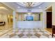 Building reception area with a curved counter and elegant design at 331 Cleveland St # 317, Clearwater, FL 33755
