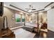 Cozy main bedroom features a four-poster bed, soft lighting, and a peaceful ambiance at 620 Ponce De Leon Dr, Tierra Verde, FL 33715