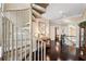 Unique spiral staircase has a handrail and leads up to the second floor at 620 Ponce De Leon Dr, Tierra Verde, FL 33715