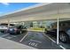 Reserved parking spaces in a carport offer shade and protection for residents' vehicles at 6201 2Nd E St # 73, St Pete Beach, FL 33706