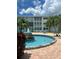 Well-maintained community with a water fountain and lush landscaping at 6201 2Nd E St # 73, St Pete Beach, FL 33706
