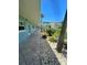 Exterior walkway of a well-maintained community with lush landscaping at 6201 2Nd E St # 73, St Pete Beach, FL 33706