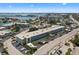 Exterior aerial view of property near the water, showing parking and nearby neighborhood at 6201 2Nd E St # 73, St Pete Beach, FL 33706