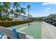 Enjoy a friendly game of shuffleboard surrounded by lush landscaping and sunny skies at 6201 2Nd E St # 73, St Pete Beach, FL 33706