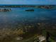 Stunning view of the waterfront with clear water and nearby homes at 12760 Indian Rocks Rd # 1036, Largo, FL 33774