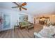 Open living area with adjacent dining and kitchen at 12760 Indian Rocks Rd # 1036, Largo, FL 33774