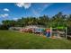 Community kayak storage with numerous kayaks in various colors at 12760 Indian Rocks Rd # 1036, Largo, FL 33774