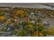 Aerial view of a property near the water, highlighted with a pin and surrounded by lush trees at 6465 30Th S St, St Petersburg, FL 33712