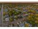 Aerial view of a neighborhood with lush greenery and the subject property marked with a pin at 6465 30Th S St, St Petersburg, FL 33712