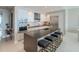 Modern kitchen features a large island with seating, stainless steel appliances, and ample cabinet space at 100 1St N Ave # 2205, St Petersburg, FL 33701